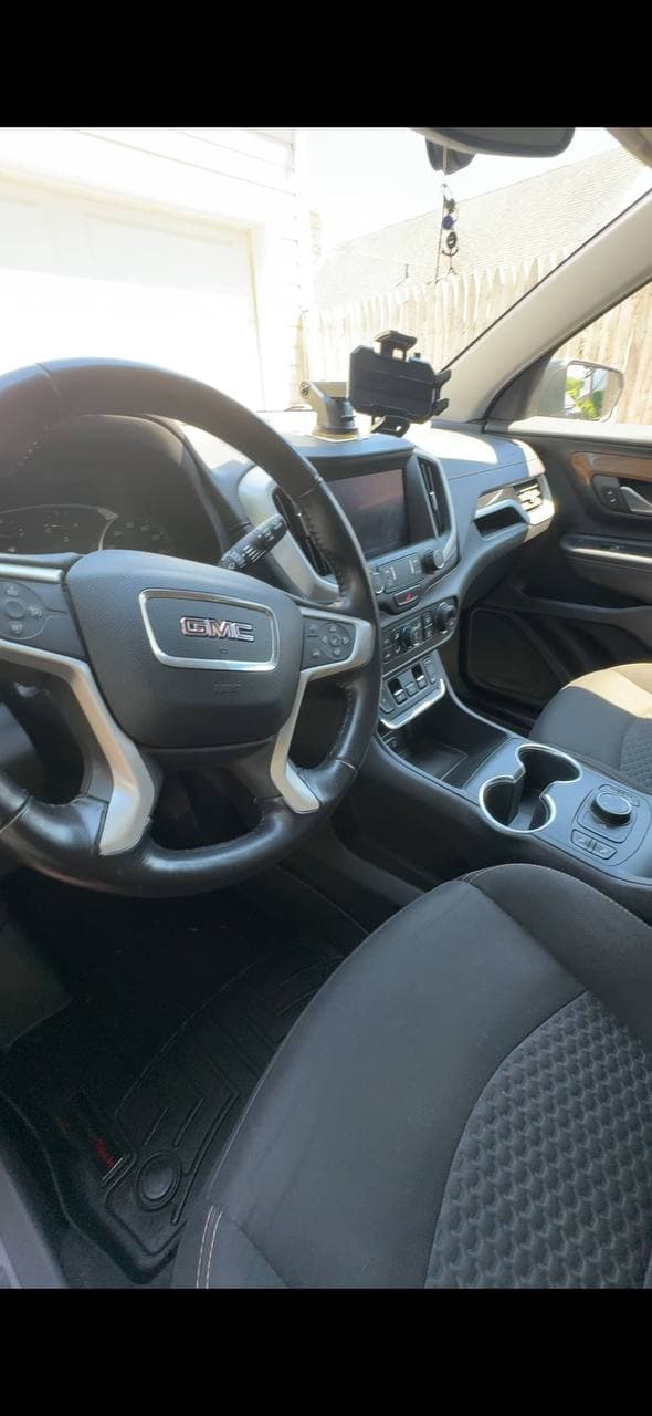 GMC dashboard and center console after interior detailing in Franklin Square